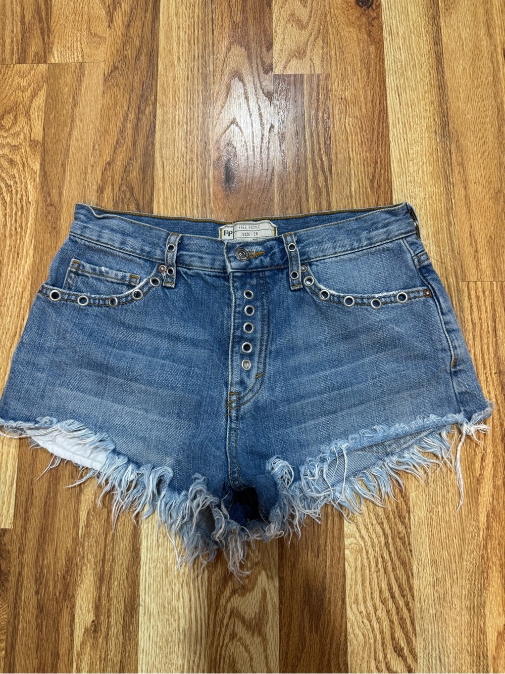Free People Barcelona Nights Denim Shorts Size 26 Button Fly Raw Hem Grommet